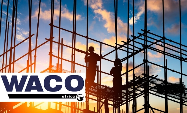 Photo of construction equipment with WACO logo