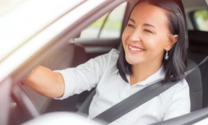 Photo of female driving a car